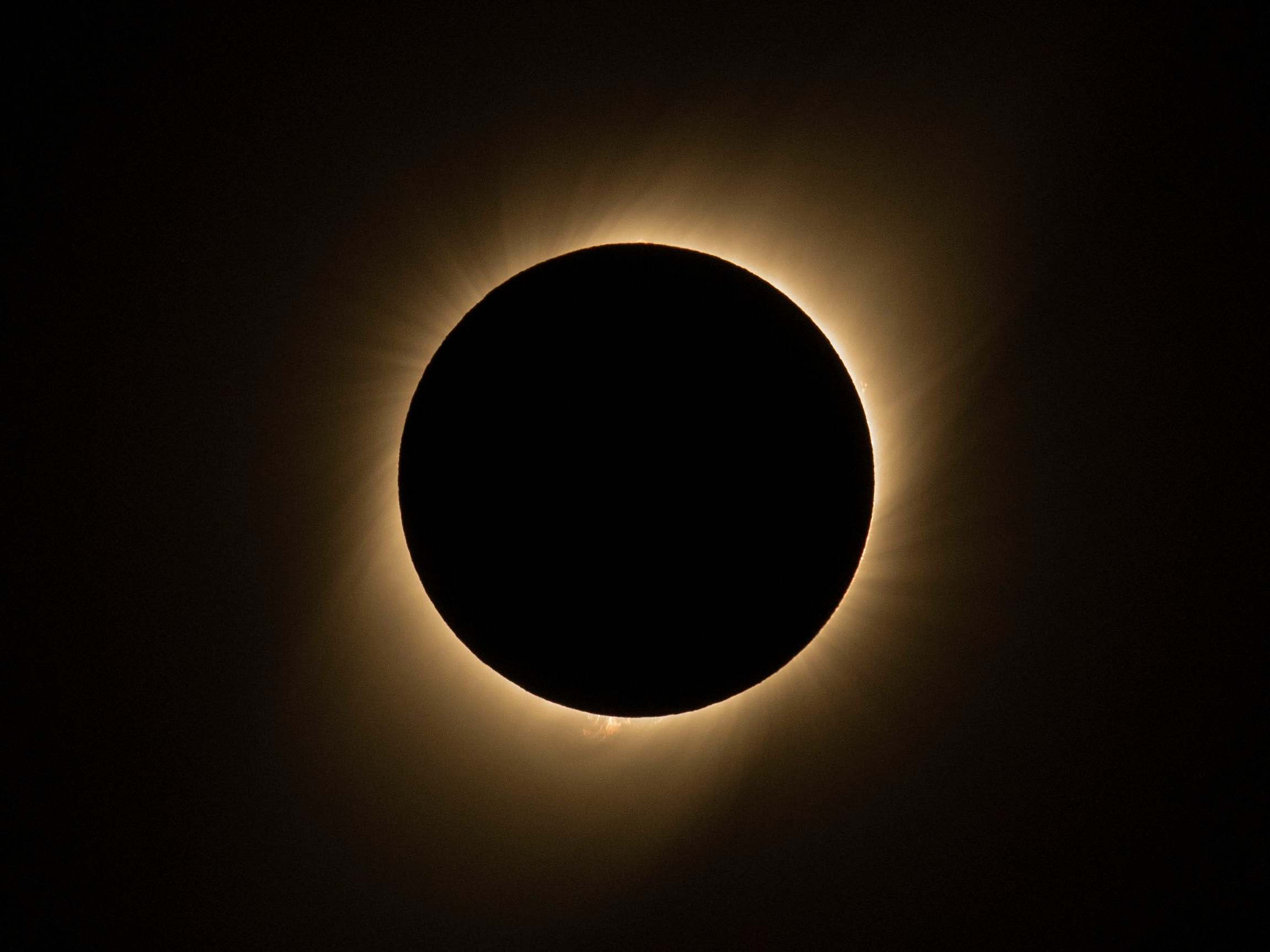 Solar eclipse: Thousands gather to watch sun darken in South America