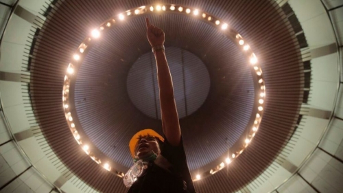In Hong Kong, one protester pulls off his mask and defines a movement
