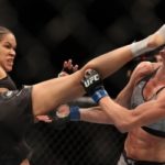 Amanda Nunes was carried out of the arena with her championship belts over her shoulders after she finished Holly Holm with a brutal head kick