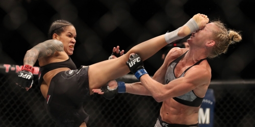 Amanda Nunes was carried out of the arena with her championship belts over her shoulders after she finished Holly Holm with a brutal head kick