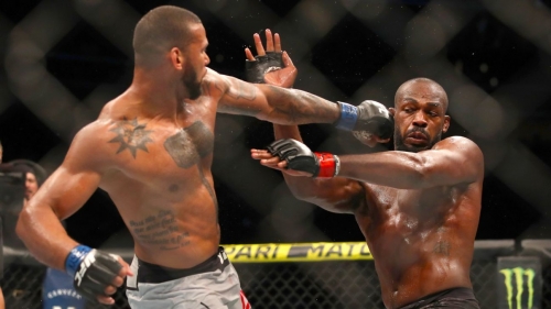 Jones escapes with narrow decision over Santos