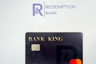 Bank card program to steer cash payments to single mothers in government housing