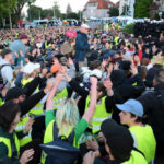 Tens of thousands of far-left protesters clash with police in anti-conservative party riots