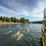 France: hundreds dive into the Seine for Paris’ first river race in 80 years