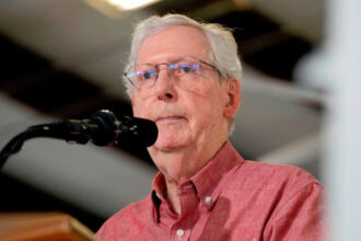 Sen. Mitch McConnell says a fall led to his hospitalization