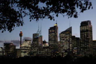 Australia business conditions steady in June; mood improves