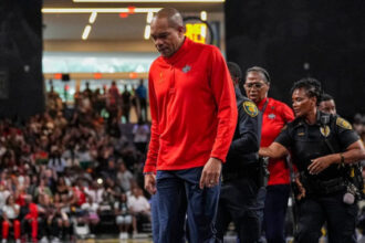 WNBA coach escorted off floor by police officers following intense moment with officials during game