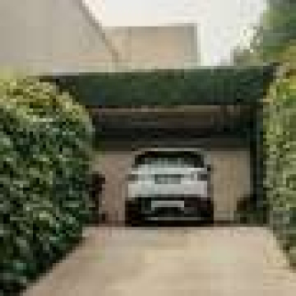 How the trend for turning front gardens into driveways is adding to night‑time heat