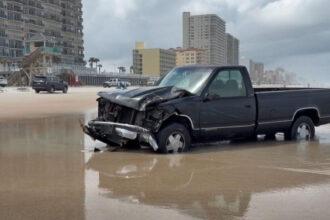 Florida beach toll booth worker killed after driver rams structure before getting stuck in sand, sheriff says