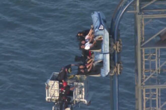 Eight riders left dangling atop 100-foot roller coaster for over three hours at Texas amusement park