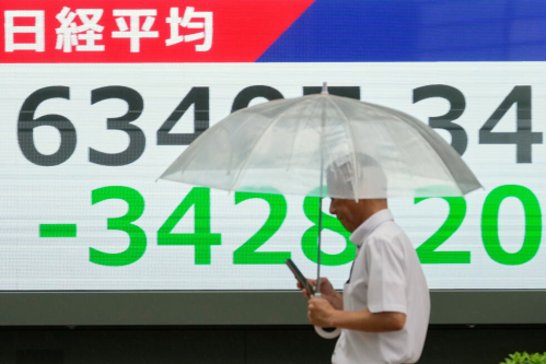 Asian shares slide following an AI-led retreat on Wall St