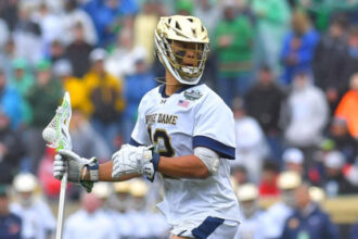 Notre Dame’s Josh Yago delivers Memorial Day salute during anthem before lacrosse championship game