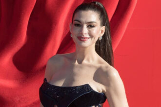 Anne Hathaway fires back at plastic surgery rumors with a surprisingly simple red carpet secret