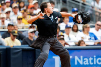 MLB’s female ump leaves both teams fuming with odd calls, NASCAR wife hits the beach & Aaron Rodgers emerges!