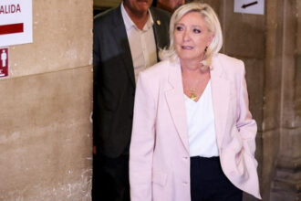 French court clears path for conservative presidential candidate, but house arrest threatens campaign