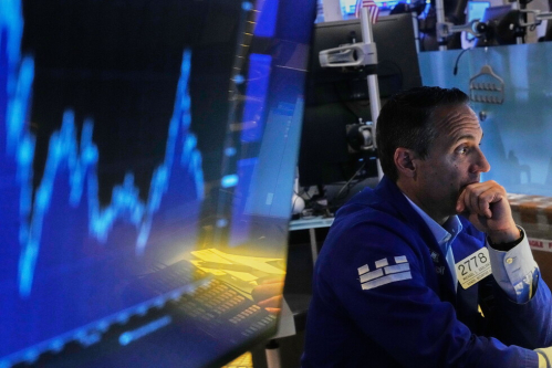 Brent oil tops $100 per barrel, as Tesla and Alphabet drag Wall Street lower