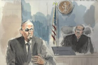 Salman Rushdie describes a ‘lake of blood’ as his convicted attacker faces terrorism charges tied to the 2022 stabbing