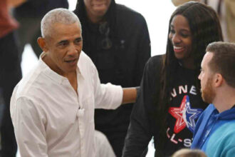 Former President Obama surprises WNBA all-stars at practice
