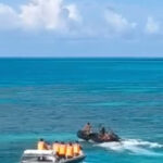 Philippines accuses Chinese coast guard of injuring Filipino sailor in disputed shoal
