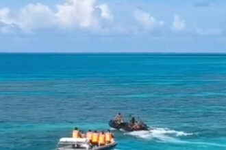 Philippines accuses Chinese coast guard of injuring Filipino sailor in disputed shoal