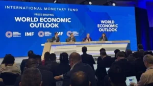 IMF says governments are squeezing savers as debt piles up