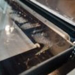 The Tiny Black Dots on Your Oven Door Have Roots in Ancient Egypt