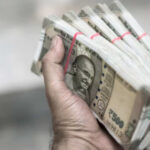 FIIs buy ₹2,446 crore in Indian stocks, but domestic selling and FMCG weakness drag markets lower