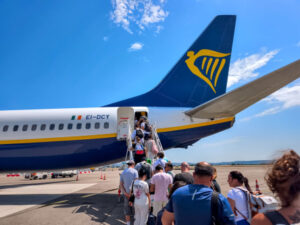 Rich Americans are propping up the travel economy as airfares soar 25% higher than last year