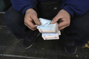 Iran’s rial currency hits new record low of more than 2 million to the dollar