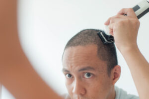 How to Give Yourself a Buzz Cut at Home, According to a Grooming Editor