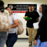 In immigration court’s mass hearings, absence can mean deportation