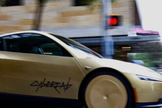 Musk pushes regulatory limits with Tesla’s Cybercab robotaxi service