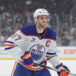 Connor McDavid appears shaken up after hit during training camp