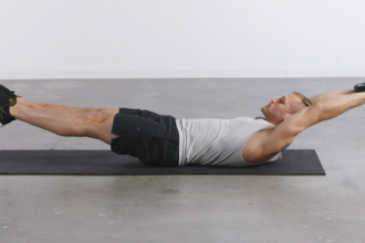 How to Master the Hollow Hold for a Stronger Set of Abs