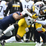 Rico Dowdle misses practice