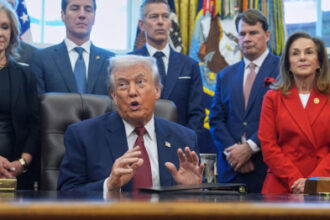Trump administration lowers fuel economy standards, critics say at a significant environmental cost